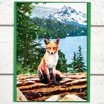 fox christmas cards, photo of a fox holiday card featuring a red fox sitting atop a fallen log, fox christmas card, fox holiday card
